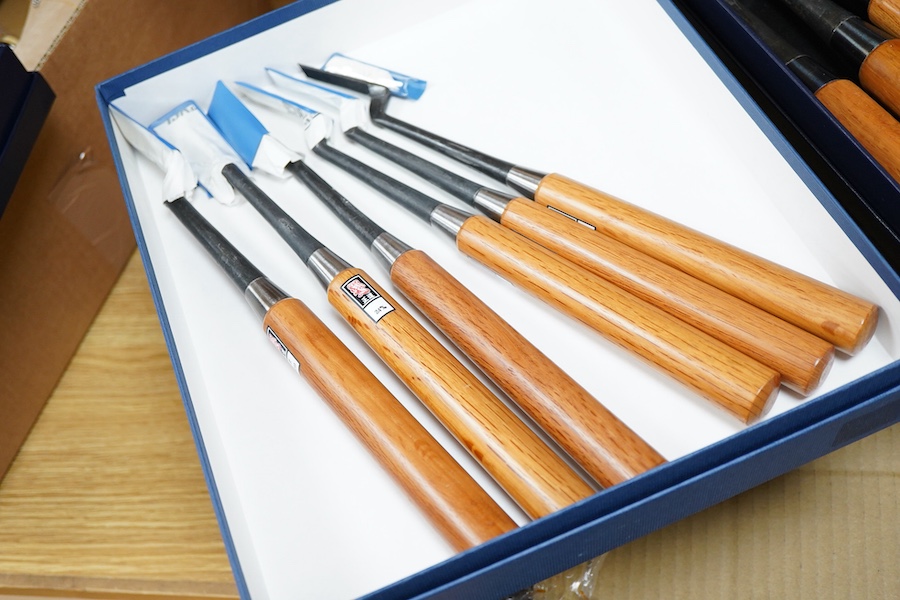 Four sets of Japanese chisels, including a set of six Kote Nomi cranked neck trowel chisels, a set of seven mortise chisels, and two other cabinetmakers sets (22 in total), plus two Japanese hammers/mallets